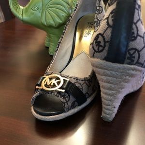 Ladies Michael Kors logo wedged shoe.  Size, 8